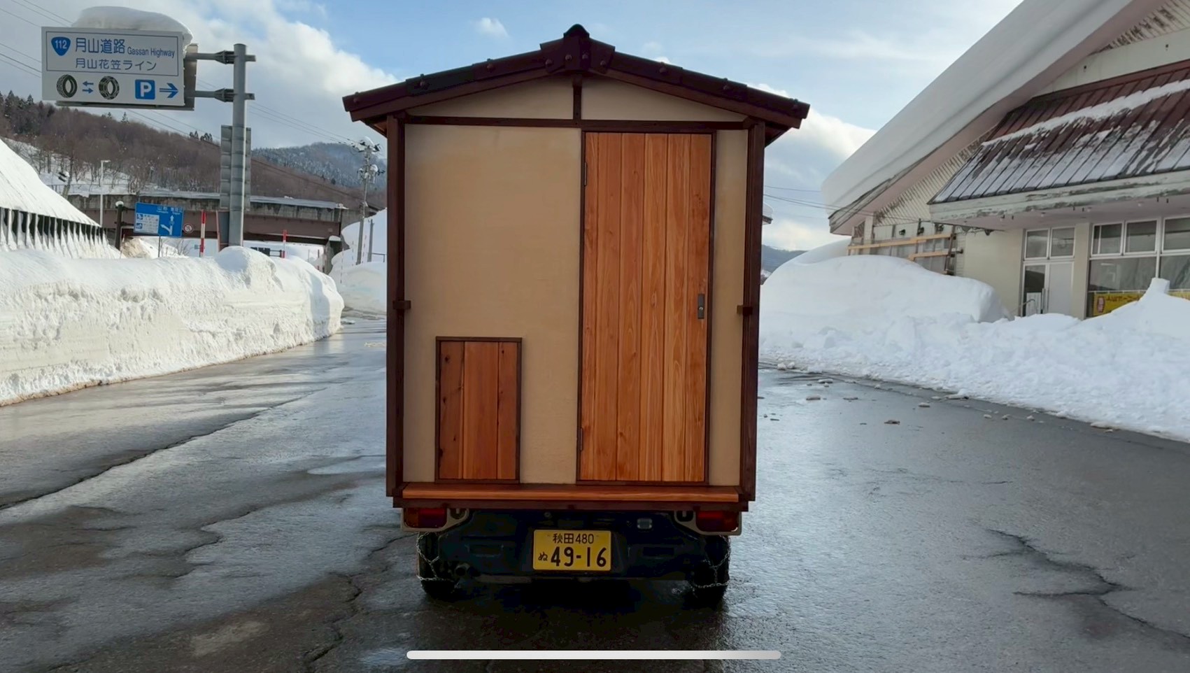 Snowy landscape with the tiny house